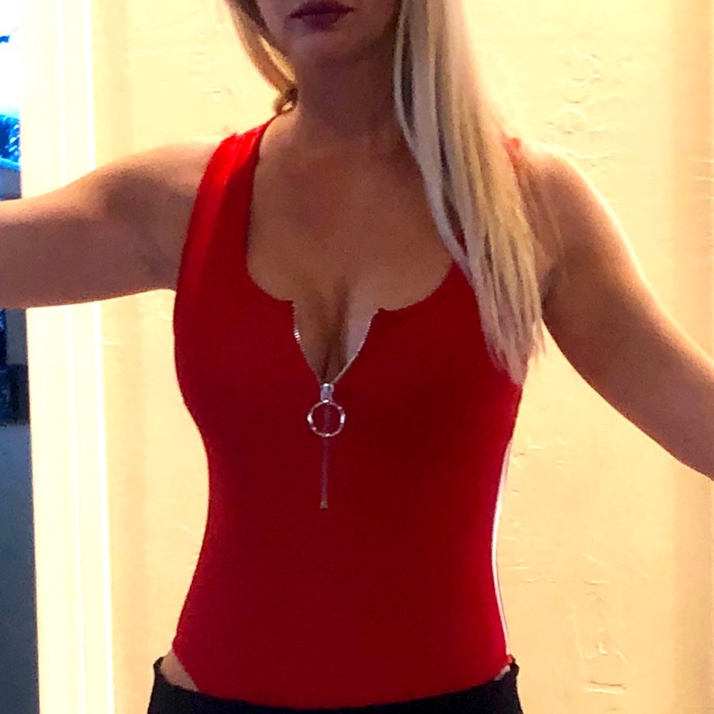 Red zip up body suit